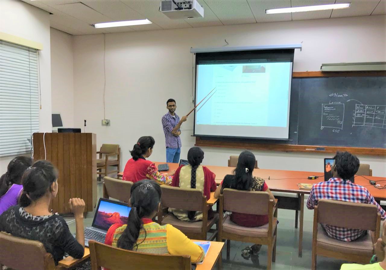 A computer class in session for villagers on campus